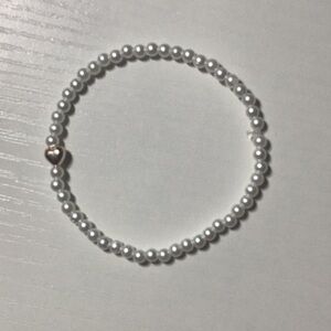 Elegant Pearl Bracelet with Heart Charm